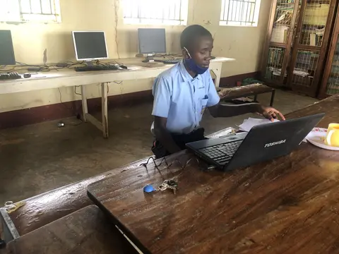 A student at Migyera Progressive SS practicing