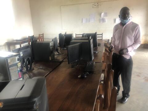 Mr. Mubiru in Kiwoko SS lab