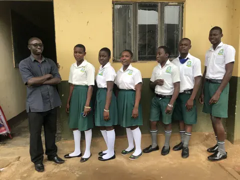 Mr. Ogwal with S4 computer class