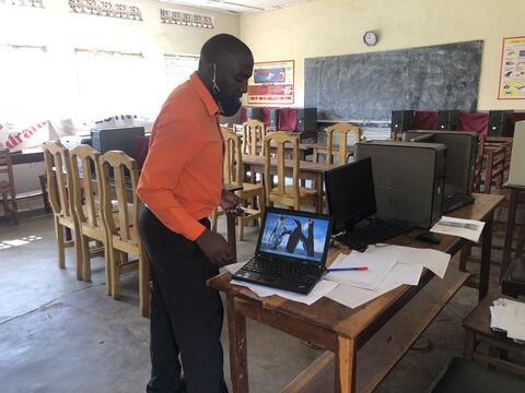 Mr. Ssendegeya in Luteete SS lab